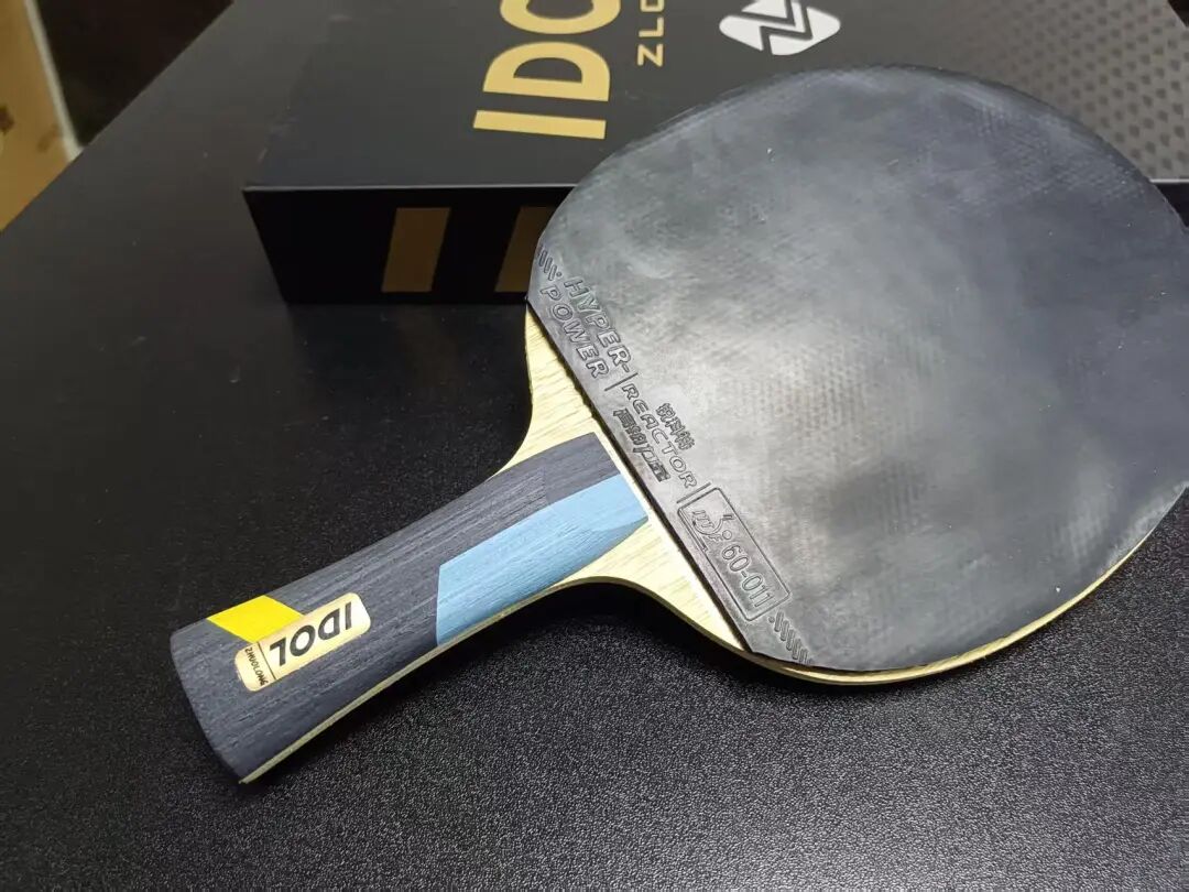 Zhuolong IDOL INNER ZLC blade in play showing linear stable arc at close-to-mid-table distance