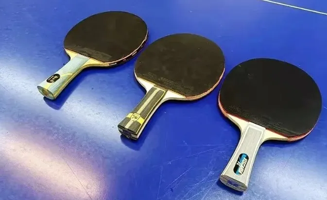 W968 inner carbon blade with digital-version handle showing slim grip design