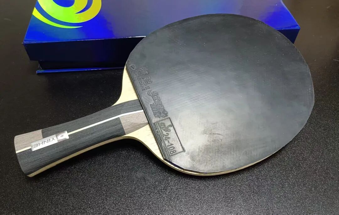 NEO Hurricane 3 rubber sheet with organic glue coating showing pre-boost sponge surface