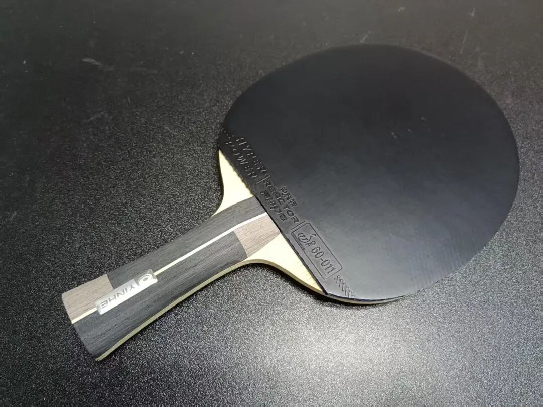 Boosted Chinese Hurricane rubber next to non-tacky semi-tacky foreign rubber for comparison