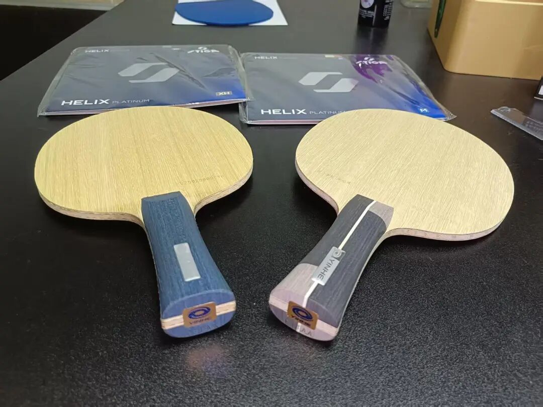 Table tennis player in ready position over table end preparing to receive serve