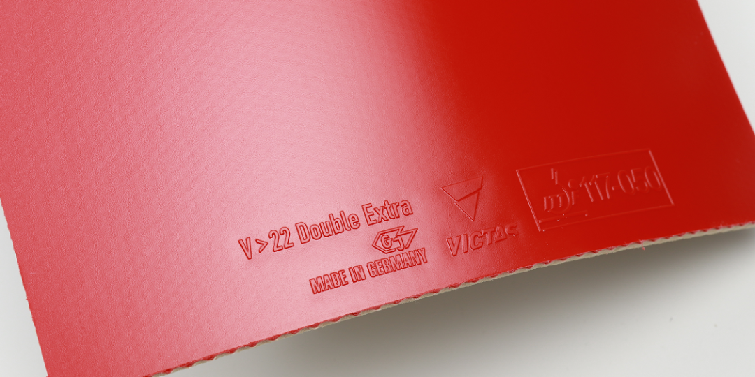 Victas V22 Double Extra tensor rubber showing textured topsheet for forehand use