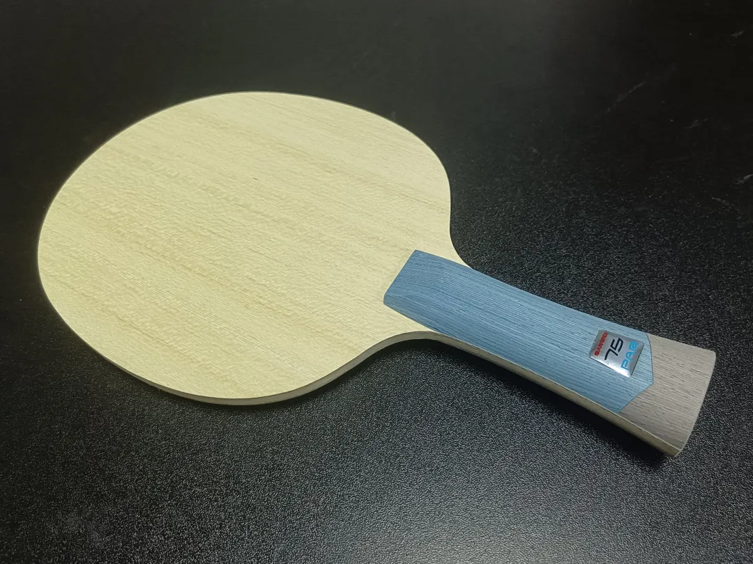 Sanwei 75PAR outer arylate-carbon blade displaying resilient fiber layers
