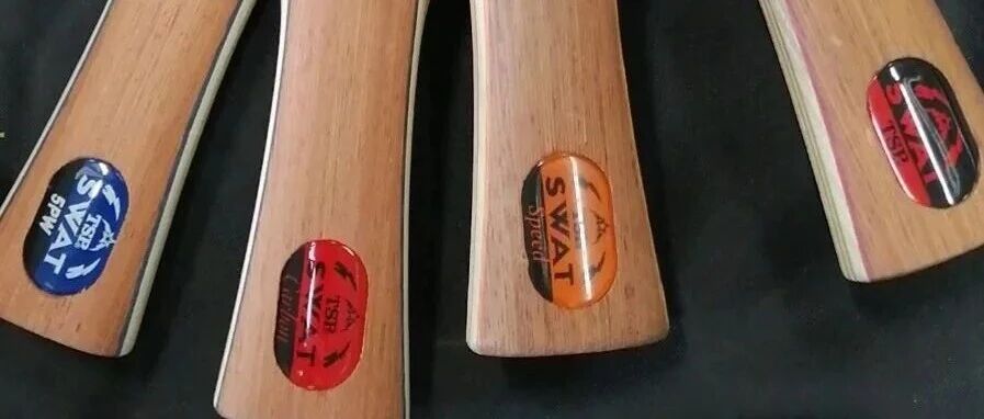 Several TSP SWAT blade handles lined up showing different models