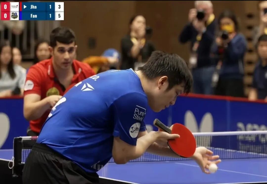 Wang Chuqin vs Harimoto Sora intense rally during game one of Macao World Cup final