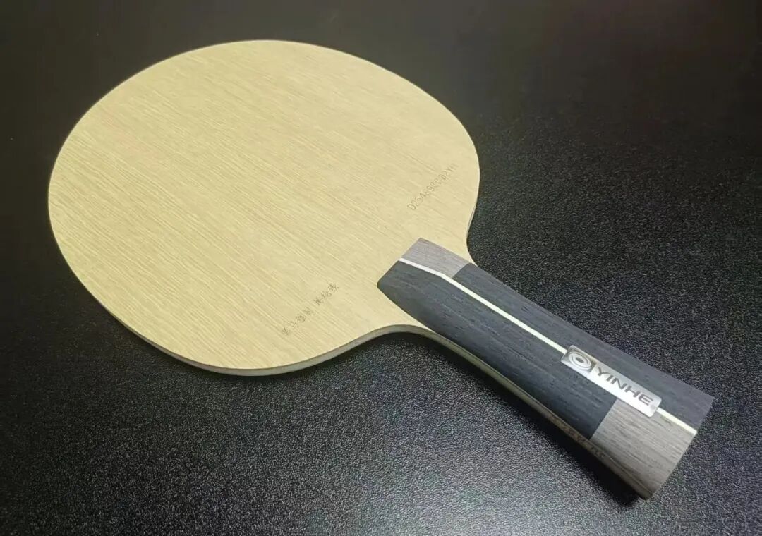Wei Guan Qingguang coaching a table tennis serve technique session