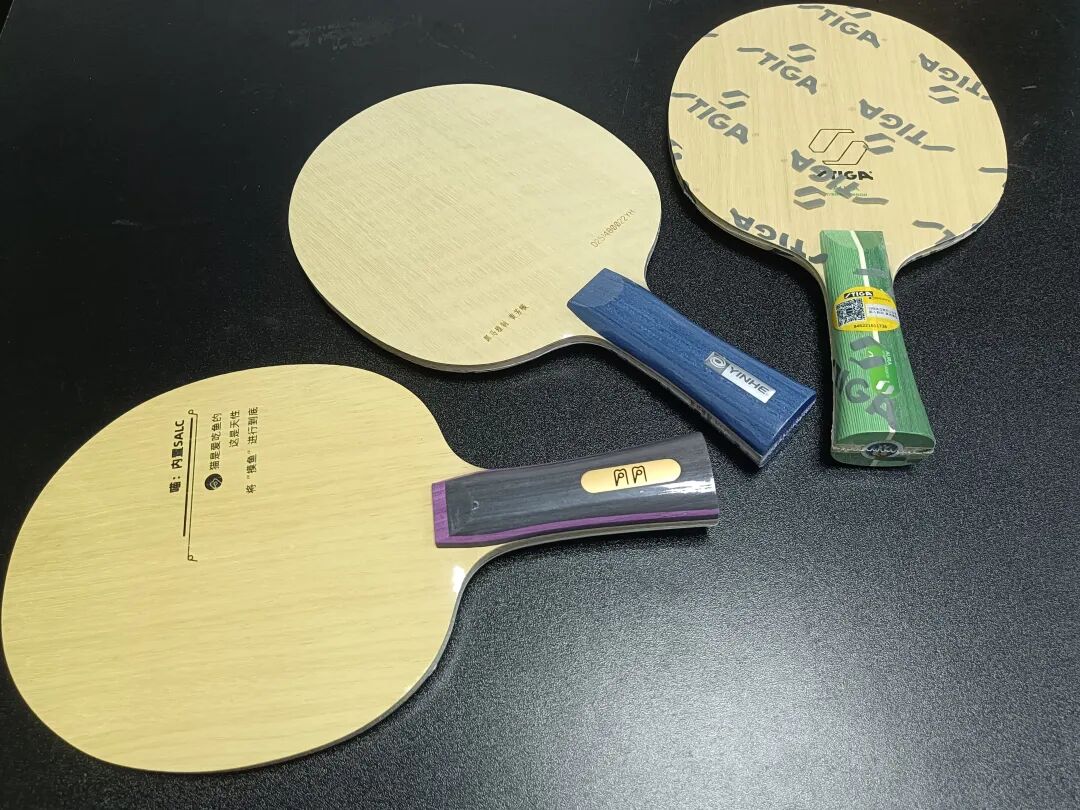 Table tennis coach demonstrating pre-match warm-up stretching routine for players