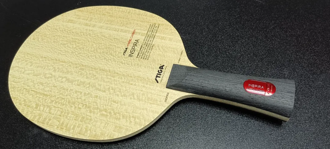 Stiga Inspira Hybrid Carbon outer green fiber carbon blade with harder crunchy feel
