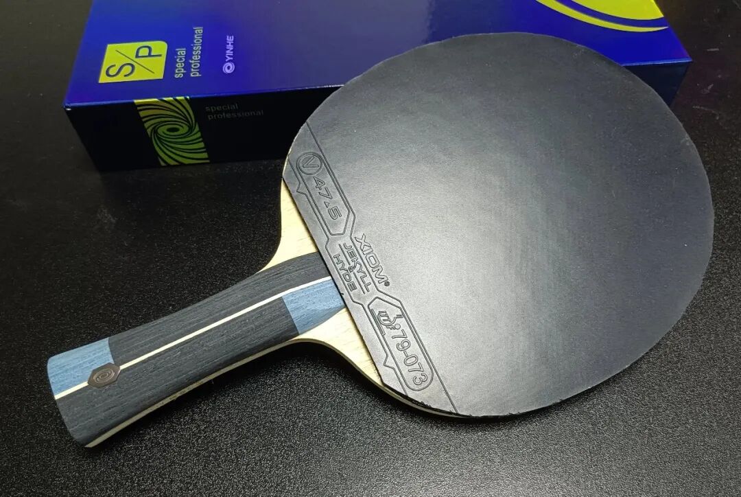 Chinese players training with black tacky forehand rubber at professional level