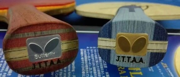 Two Butterfly blades showing their handle ends side by side