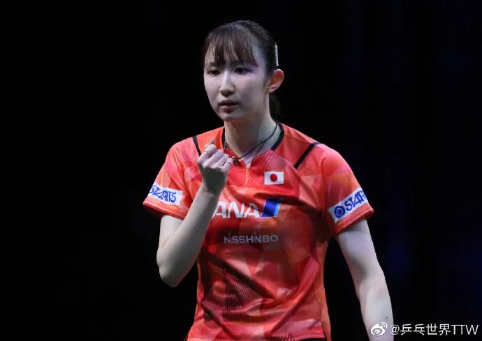 Hina Hayata serving at a professional table tennis tournament