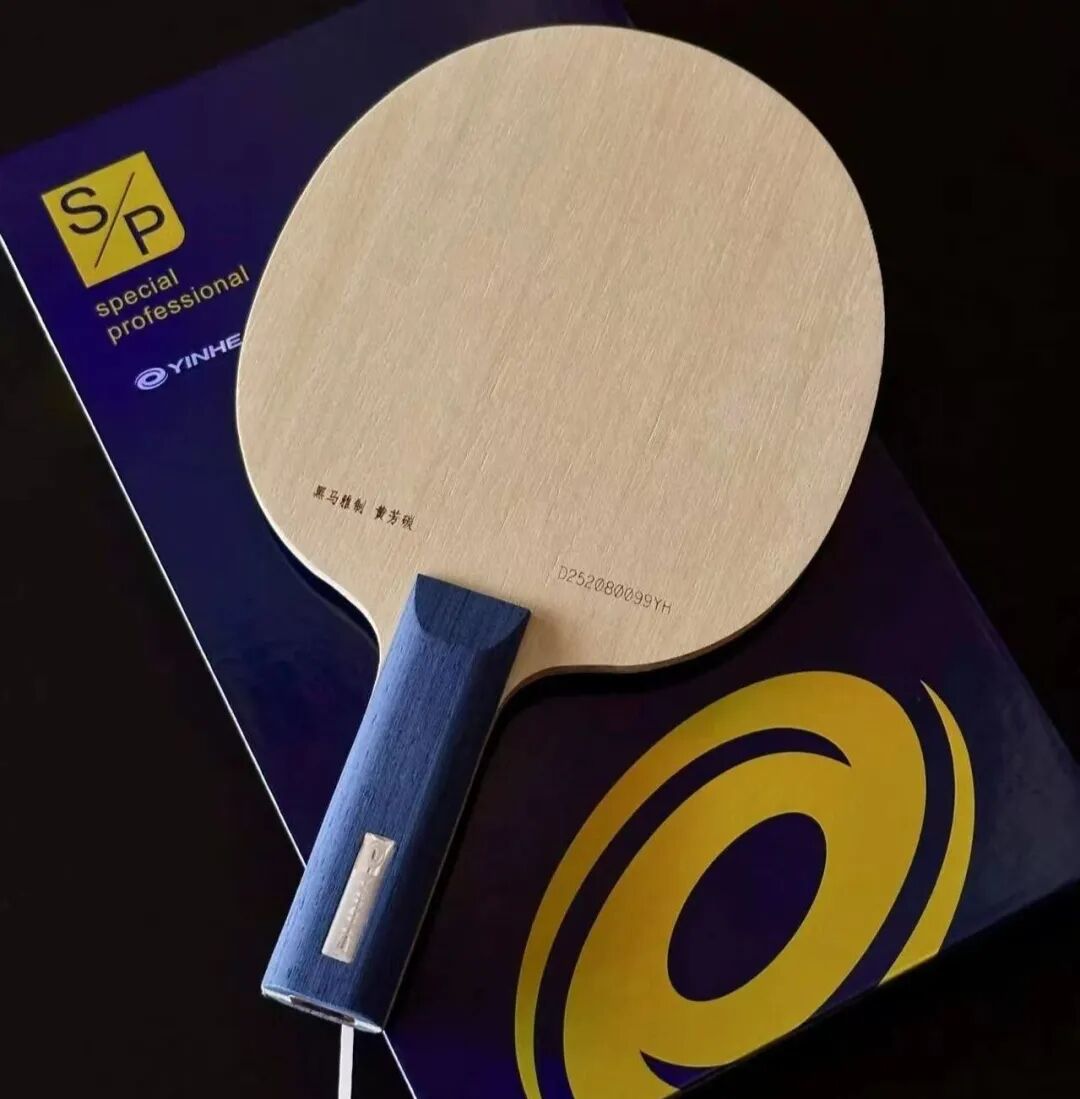 Table tennis player demonstrating grip-switching technique with long pips paddle