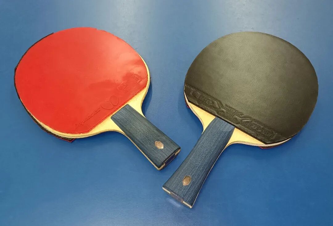 Yinhe custom blade and paddle used during high-level sparring session at a club