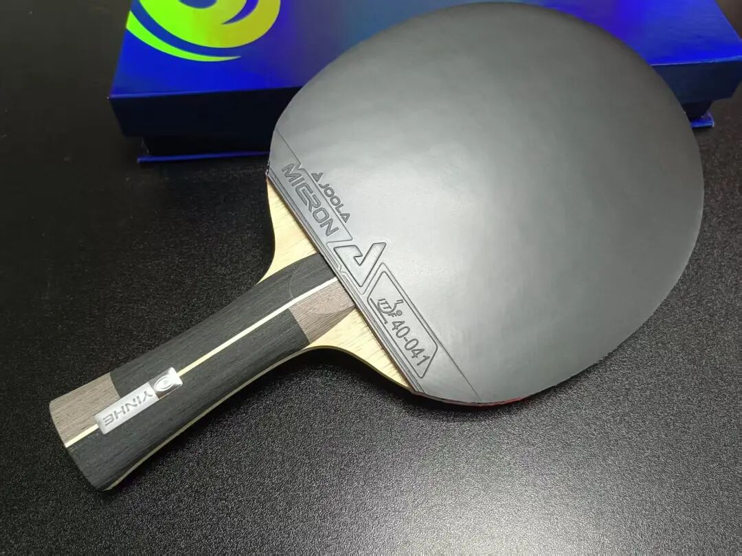 JOOLA beginner rubber purple sponge cross-section showing thickness and density