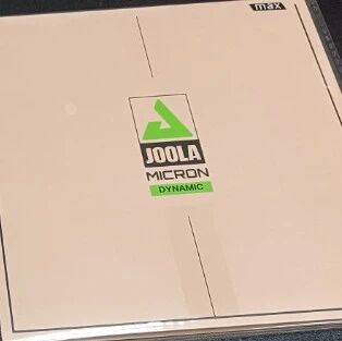 JOOLA Micron Dynamic rubber package on a dark surface
