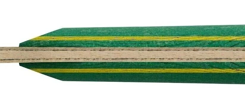 Close-up cross-section of a JOOLA blade showing green-dyed fiber layers between wood plies