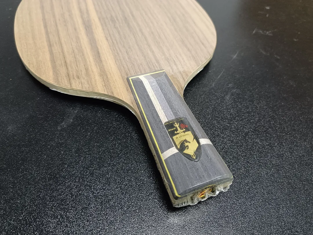 Hard-faced inner KLC N301 blade with koto face ply demonstrating stiff surface feel