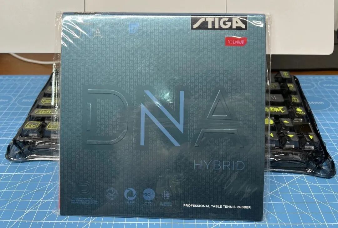 Stiga DNA Hybrid M rubber topsheet showing semi-tacky smooth surface texture