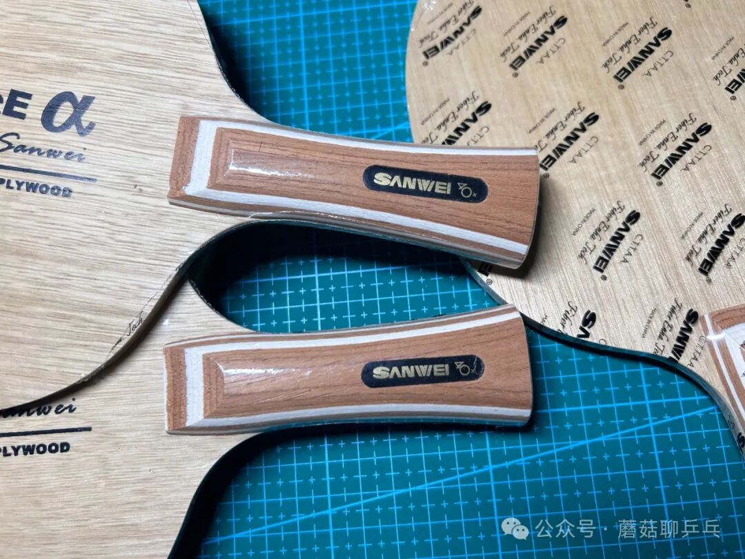 Close-up of Sanwei Defence Alpha handle and blade edge profile