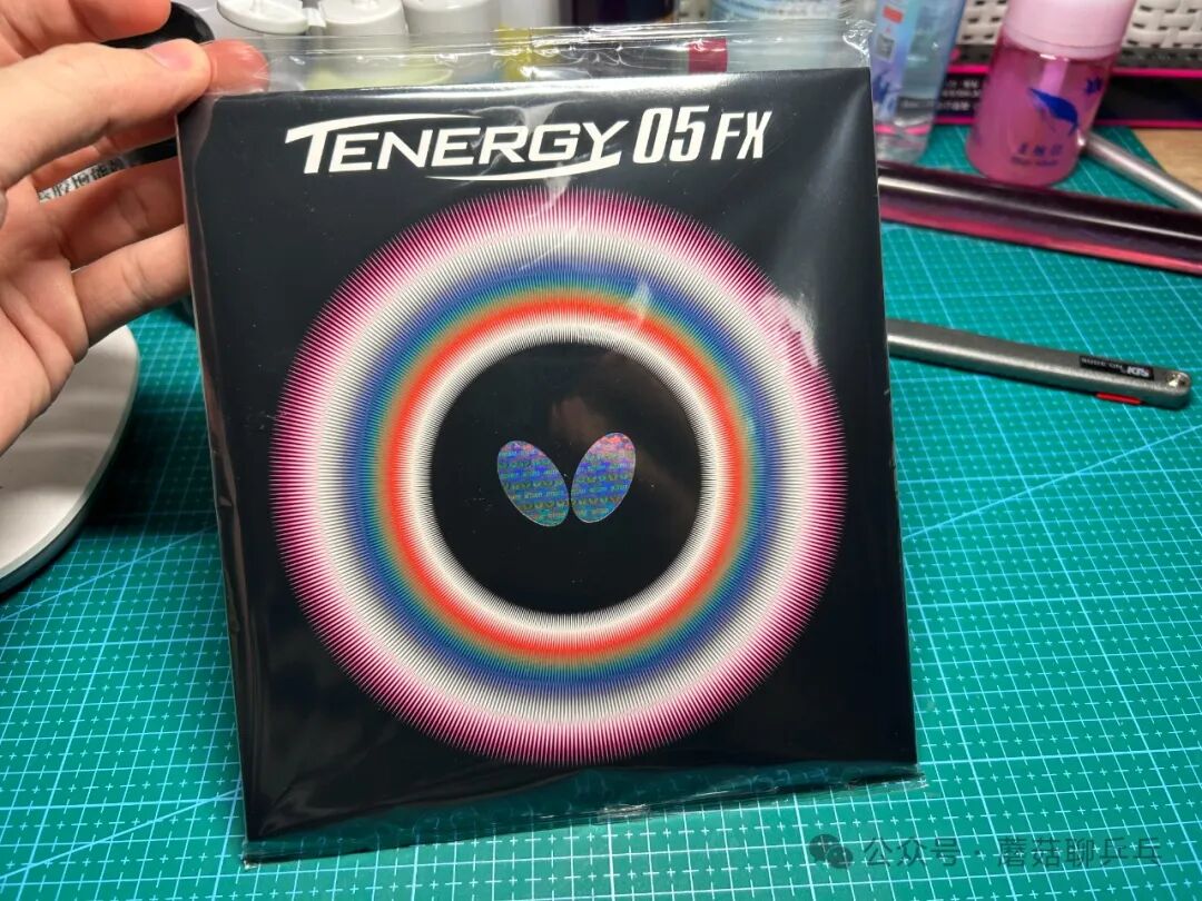 Butterfly Tenergy 05 FX red rubber sheet showing surface texture and Butterfly logo