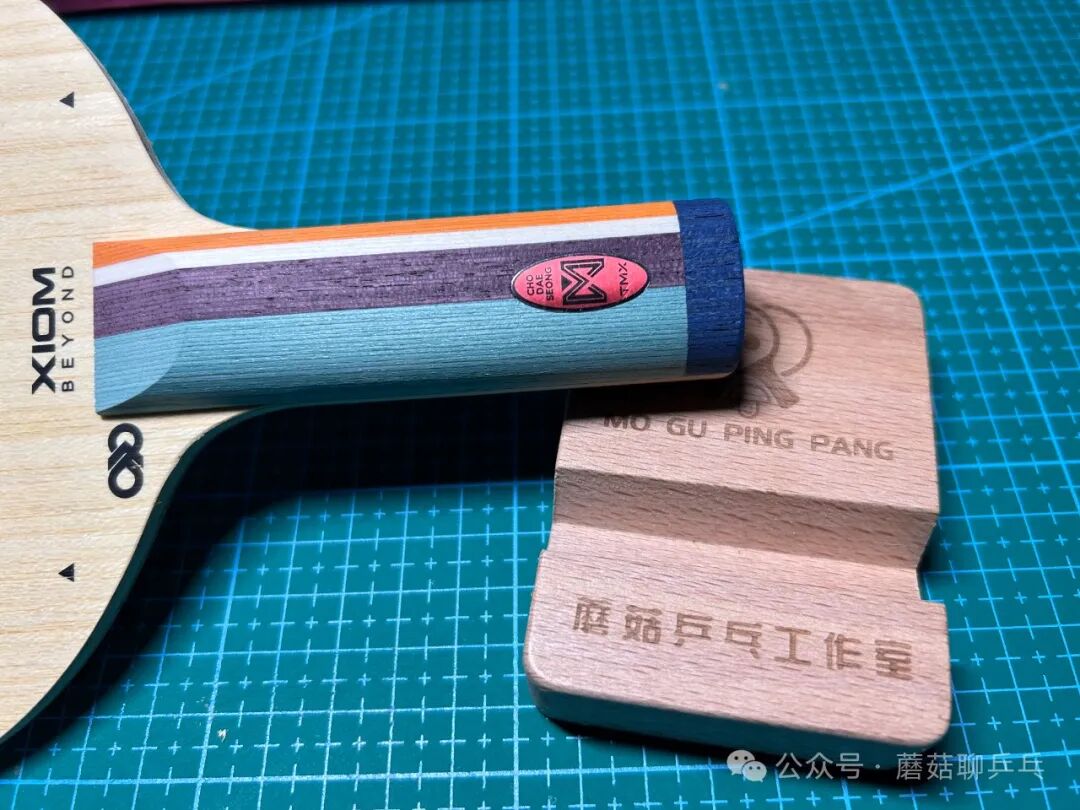 Five-color handle detail on XIOM TMX PRO with oval-shaped labels on both sides