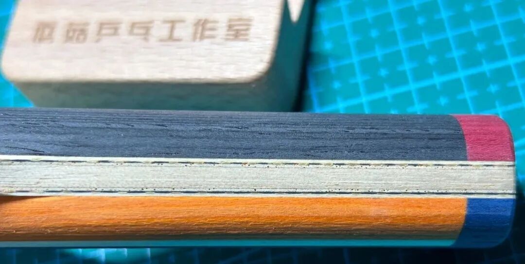 XIOM TMX PRO blade face showing large 158x152mm head and KOTO outer ply