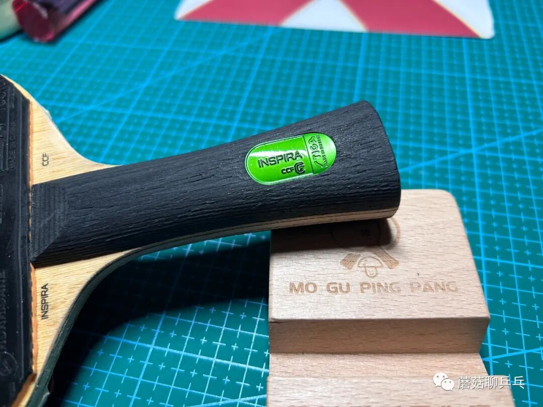 Stiga Inspira Carbon blade spin test showing deep grip of Hurricane rubber pairing