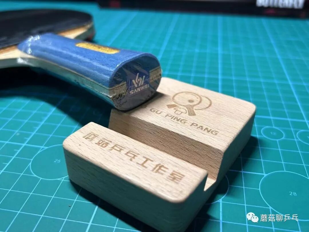 Sanwei Blue Marlin Pro ST handle side view with fire-branded inscription detail