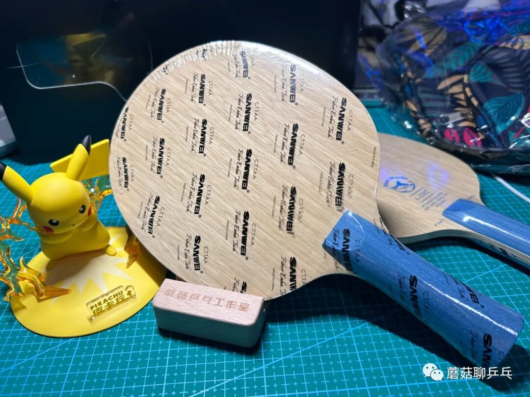 Sanwei Blue Marlin Pro blade angled view showing carbon layer construction