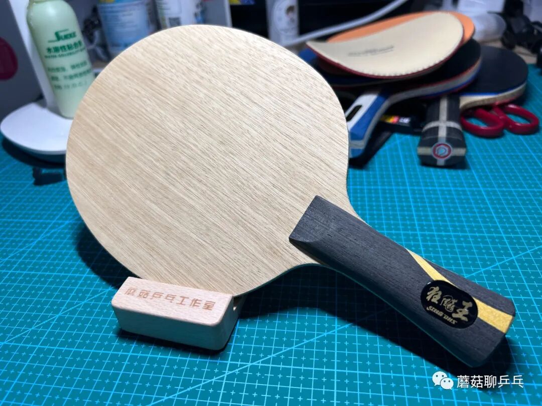 DHS Hurricane Wang Chuqin blade face veneer and packaging front view