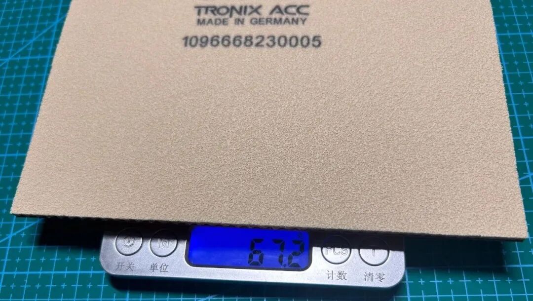 Joola Tronix ACC rubber topsheet pip surface close-up showing grip texture
