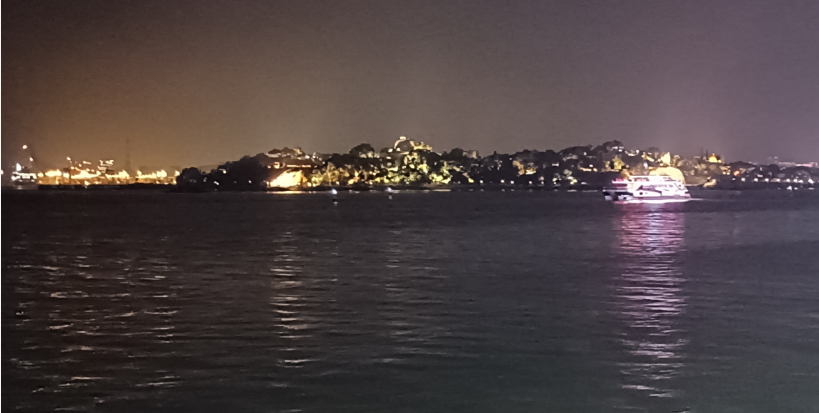 Panoramic Xiamen seaside scene at dusk, peaceful waterfront walk