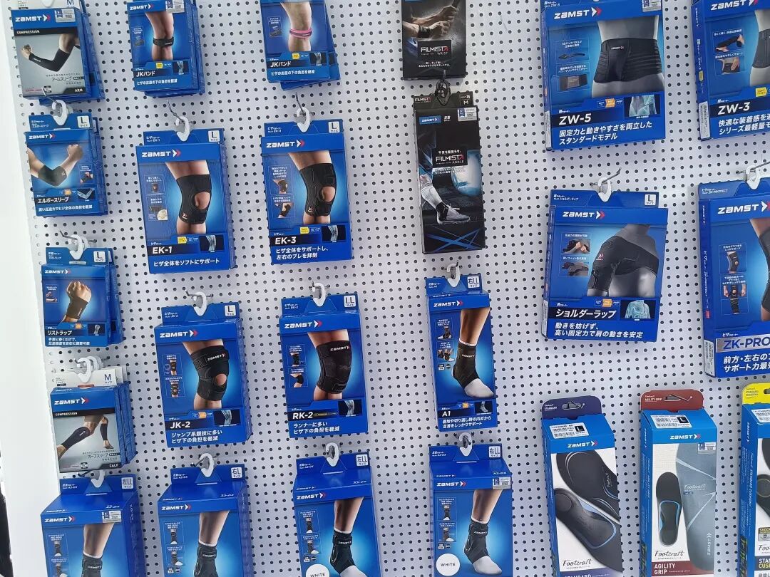 Mizuno table tennis shoe and racket lineup on display at expo