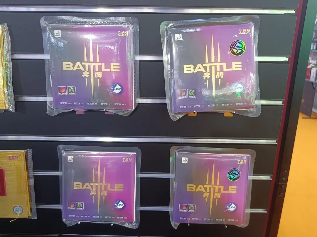 729 Penting 3 Purple Lightning and other rubber models at expo booth