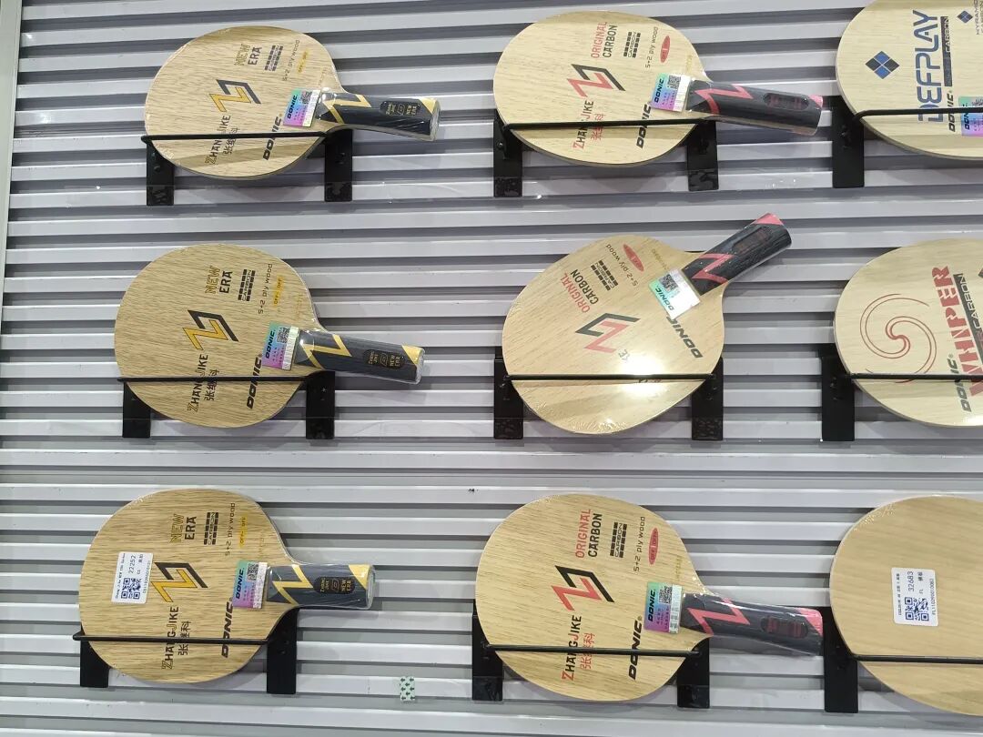 Donic Zhang Jike red and yellow rubber models on display at expo booth
