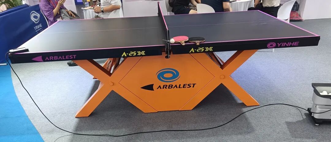 Yinhe Galaxy A-25X co-branded ARBALEST table tennis table at expo booth