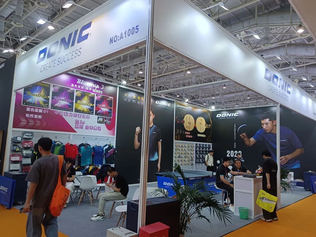 Donic table tennis booth overview at Xiamen Sports Expo with blades and rubbers