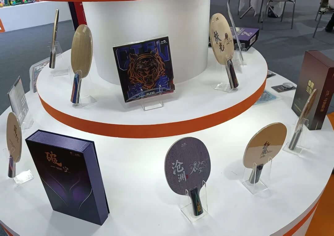 Double Fish table tennis balls and rubber lineup at expo booth