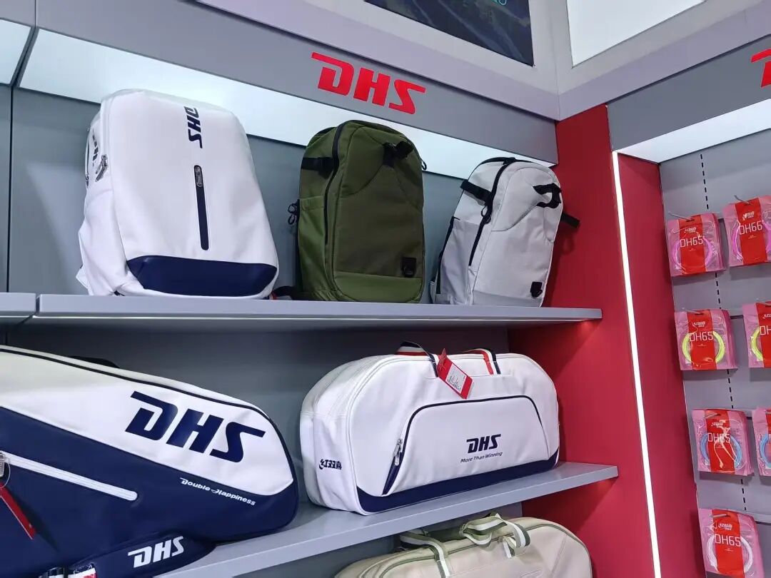 DHS branded sports bags and table tennis jerseys at Xiamen expo booth