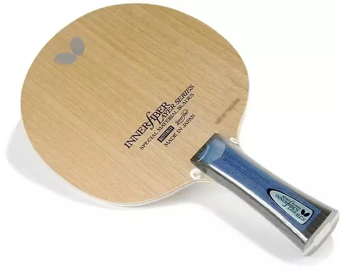 Butterfly Innerforce Layer ALC.S blade resting on a blue bag showing its slim profile and handle
