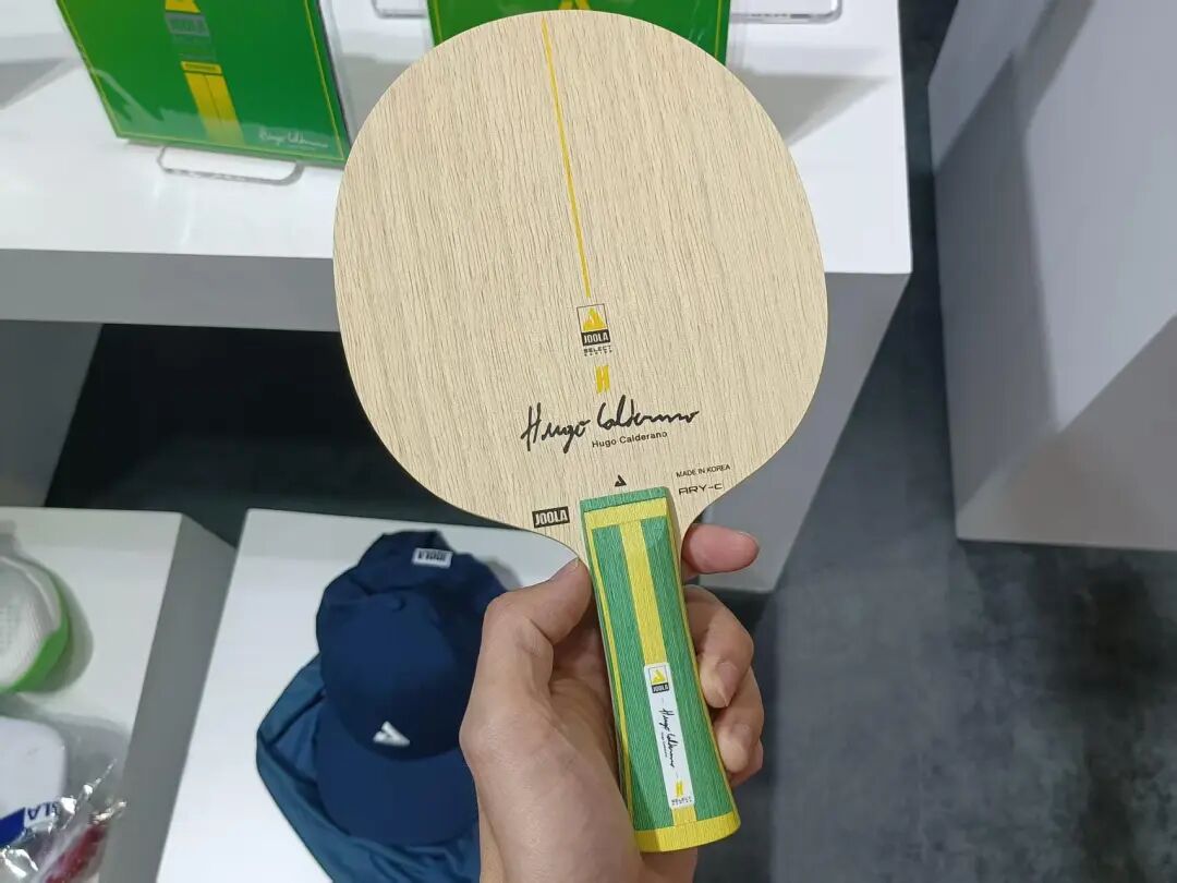 JOOLA Hugo Calderano 968 inner green aramid carbon blade close-up front view