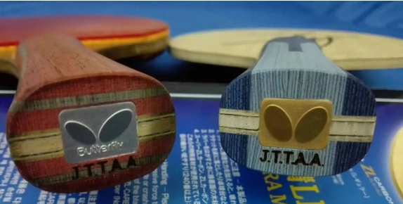 Blade bonding process showing glue application and layered wood construction