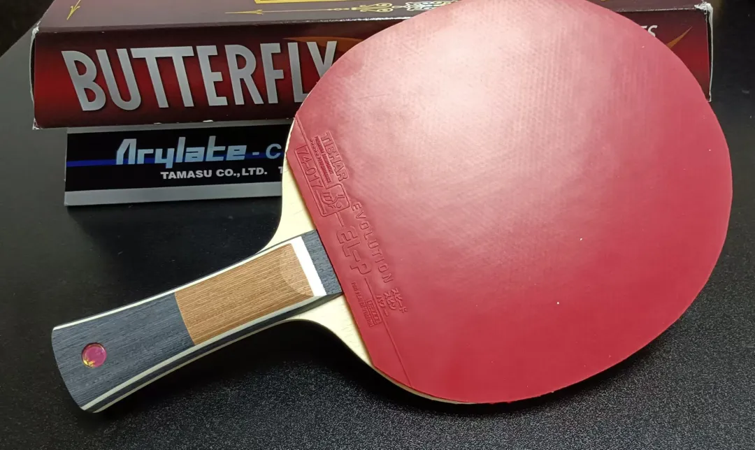 Tibhar Evolution el-p rubber on a table tennis blade backhand side