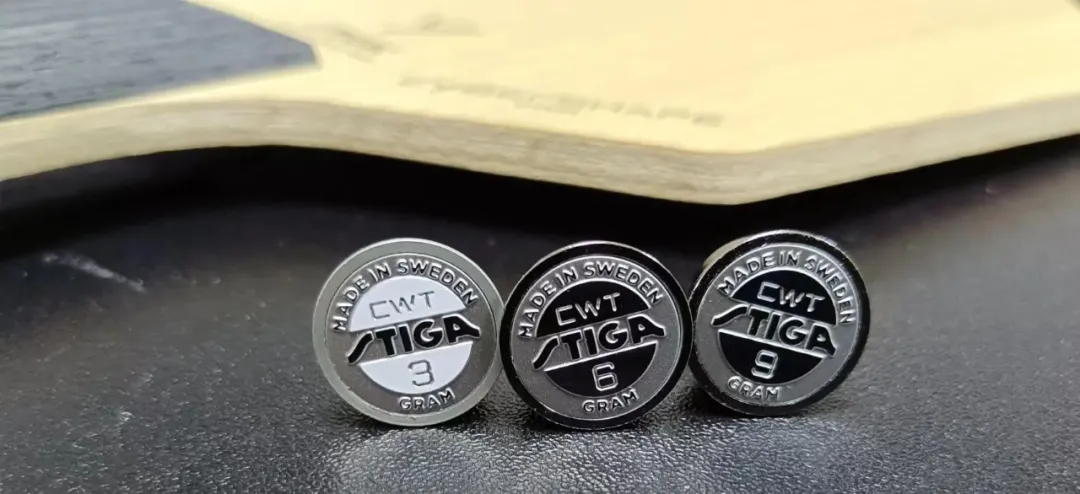 Stiga Cyber 6 blade handle with weight inserts showing 3g 6g and 9g options