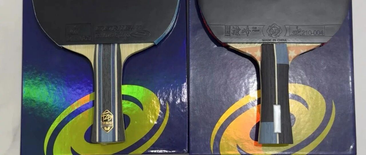 Two table tennis paddles with rubber sheets laid against colorful box packaging, showing cross-section of inner carbon blade construction