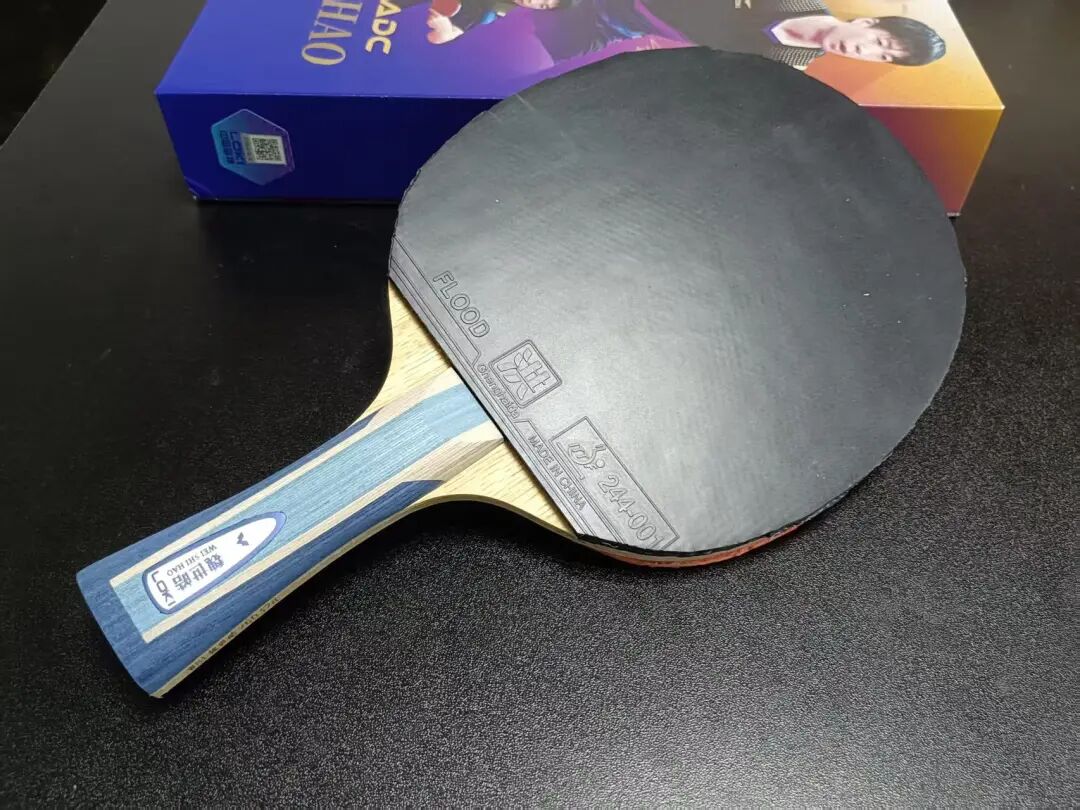 Loki Wei Shihao ADC blade showing large head and slim handle with head-heavy balance