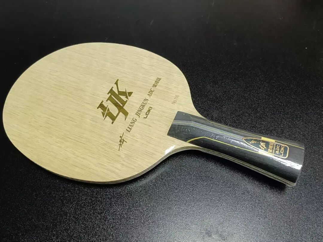 LOKI Liang Jingkun ADC Special Edition S-size blade back face on dark background