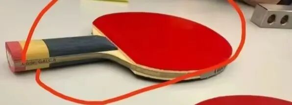 Liang Jingkun and Eduard Ionescu facing off in the men's singles at London World Team Championships
